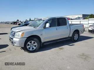 2004 Nissan Titan LE z VIN 1N6AA07B64N525238, wystawiony jako Copart lot #60370775 z przebiegiem Nie podano mil oraz Czysty tytuł • Clean title. Historia ofert i sprzedaży dostępna na DreamBid. Obrazek 1.