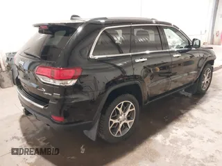 2021 Jeep Grand Cherokee Limited with VIN 1C4RJFBGXMC709346, listed as a IAAI auction lot 41806427 with 79,799 mi miles and . Bid and sale history available at DreamBid. Image 4.