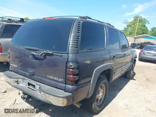 2002 Chevrolet Tahoe LT with VIN 1GNEC13ZX2R273935, listed as a IAAI auction lot 42036083 with 205,995 mi miles. Bid and sale history available at carsss.com. Image 4.