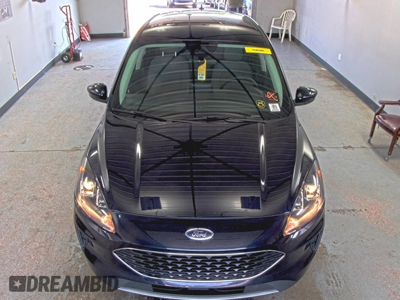 2021 Ford Escape SE Hybrid z VIN 1FMCU9BZ3MUA52539, wystawiony jako IAAI lot #42437654 z przebiegiem 59 148 mil mil oraz . Historia ofert i sprzedaży dostępna na DreamBid. Obrazek 25.