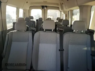 2015 Ford Transit Passenger XL with VIN 1FBAX2CM6FKA30454, listed as a Copart auction lot 77567934 with 253,608 mi miles and Clean Title. Bid and sale history available at DreamBid. Image 10.