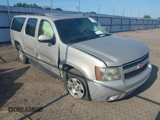 2007 Chevrolet Suburban LS with VIN 1GNFC16007J203853, listed as a IAAI auction lot 39454050 with 246,521 mi miles and . Bid and sale history available at DreamBid. Image 1.