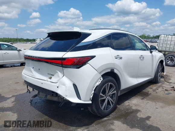 2023 Lexus RX 350 with VIN JTJCHMAA3P2009288, listed as a IAAI auction lot 42097583 with 37,475 mi miles and . Bid and sale history available at DreamBid. Image 4.