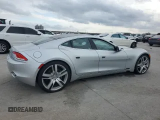 2012 Fisker Karma EcoSport z VIN YH4K14AA0CA001402, wystawiony jako Copart lot #82791574 z przebiegiem Nie podano mil oraz Szkody całkowita. Historia ofert i sprzedaży dostępna na DreamBid. Obrazek 3.