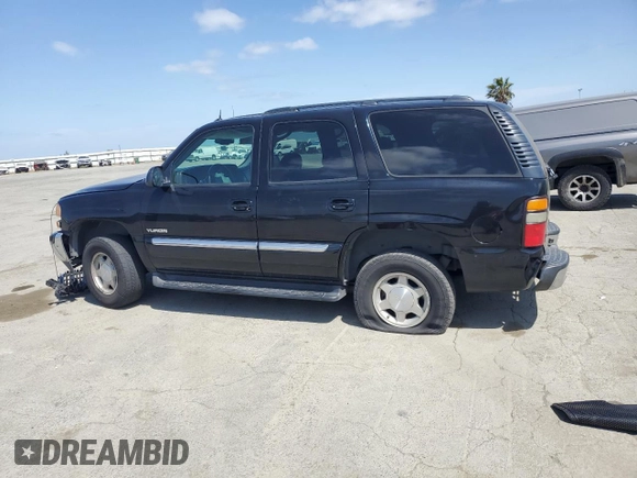 2005 GMC Yukon SLT with VIN 1GKEC13T95R258971, listed as a Copart auction lot 53548835 with 329,345 mi miles and Salvage Title. Bid and sale history available at carsss.com. Image 2.