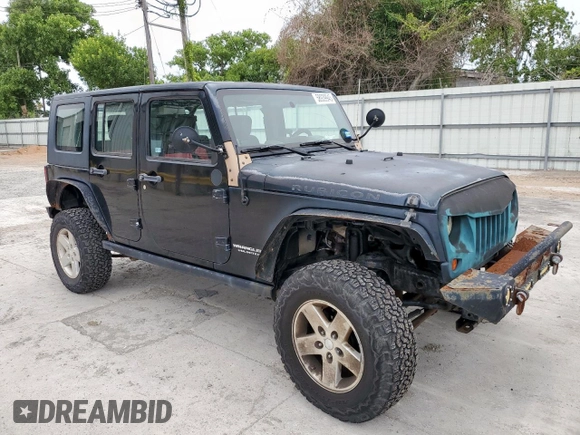 2008 Jeep Wrangler Unlimited Rubicon z VIN 1J4GA69128L529271, wystawiony jako Copart lot #58939945 z przebiegiem 94 503 mil mil oraz Szkoda całkowita • Salvage title. Historia ofert i sprzedaży dostępna na DreamBid. Obrazek 4.