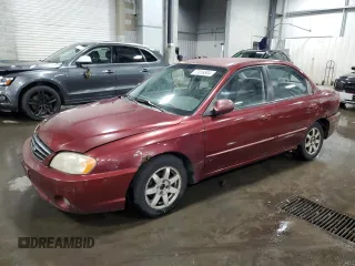 2003 Kia Spectra with VIN KNAFB121735217341, listed as a Copart auction lot 72016504 with 116,224 mi miles and Salvage Title. Bid and sale history available at DreamBid. Image 1.