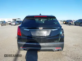 2024 Cadillac XT5 FWD Premium Luxury with VIN 1GYKNCRS4RZ729461, listed as a IAAI auction lot 41411300 with 5,760 mi miles. Bid and sale history available at carsss.com. Image 16.