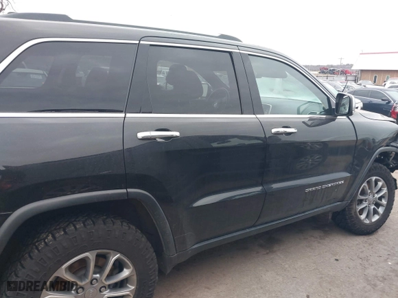 2015 Jeep Grand Cherokee Limited with VIN 1C4RJFBM9FC155161, listed as a IAAI auction lot 41590740 with 103,927 mi miles. Bid and sale history available at carsss.com. Image 14.