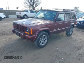 2000 Jeep Cherokee Classic with VIN 1J4FF58S7YL122676, listed as a IAAI auction lot 41710310 with 124,758 mi miles. Bid and sale history available at carsss.com. Image 2.