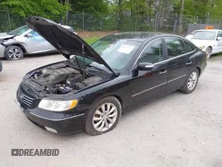 2007 Hyundai Azera SE z VIN KMHFC46F67A244191, wystawiony jako IAAI lot #42273775 z przebiegiem 178 713 mil mil oraz . Historia ofert i sprzedaży dostępna na DreamBid. Obrazek 2.