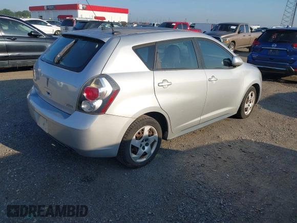 2009 Pontiac Vibe 1SA with VIN 5Y2SP678X9Z473576, listed as a IAAI auction lot 42709951 with 165,434 mi miles and . Bid and sale history available at DreamBid. Image 4.