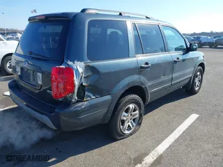 2003 Honda Pilot EX with VIN 2HKYF18503H610799, listed as a IAAI auction lot 41528867 with 323,810 mi miles. Bid and sale history available at carsss.com. Image 4.
