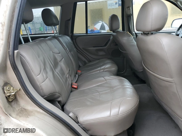 2004 Jeep Grand Cherokee Laredo with VIN 1J4GX48S84C263276, listed as a Copart auction lot 50401355 with 269,019 mi miles and Salvage Title. Bid and sale history available at carsss.com. Image 11.