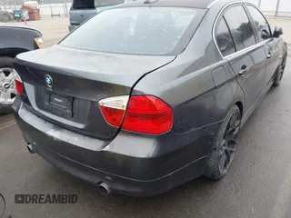 2007 BMW 3 Series 335i with VIN WBAVB73527PA87305, listed as a IAAI auction lot 41277204 with 107,699 mi miles. Bid and sale history available at carsss.com. Image 12.