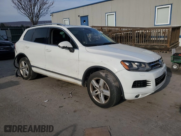 2013 Volkswagen Touareg Lux with VIN WVGEF9BP5DD000427, listed as a Copart auction lot 82340364 with Not Provided miles and Salvage Title. Bid and sale history available at DreamBid. Image 4.