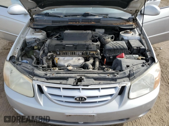 2008 Kia Spectra EX z VIN KNAFE121185541321, wystawiony jako Copart lot #55216295 z przebiegiem 120 833 mil mil oraz Szkoda całkowita • Salvage title. Historia ofert i sprzedaży dostępna na DreamBid. Obrazek 11.