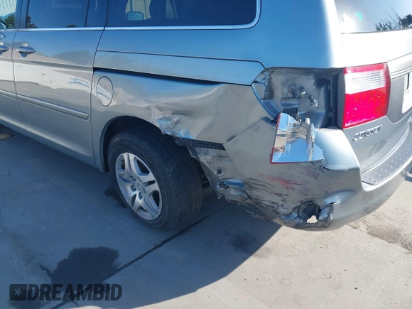 2007 Honda Odyssey EX-L with VIN 5FNRL38727B028976, listed as a IAAI auction lot 42138341 with 169,936 mi miles. Bid and sale history available at carsss.com. Image 6.