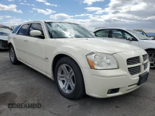2005 Dodge Magnum RT z VIN 2D8GV58245H510570, wystawiony jako Copart lot #55069945 z przebiegiem 164 533 mil mil oraz Szkoda całkowita • Salvage title. Historia ofert i sprzedaży dostępna na DreamBid. Obrazek 4.