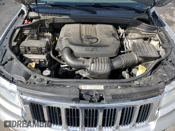2011 Jeep Grand Cherokee Laredo with VIN 1J4RR4GG1BC576277, listed as a Copart auction lot 63220925 with 149,573 mi miles and Salvage title. Bid and sale history available at DreamBid. Image 12.