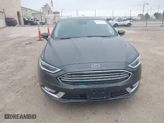 2017 Ford Fusion Energi Titanium with VIN 3FA6P0SU8HR104727, listed as a IAAI auction lot 41242482 with 83,021 mi miles. Bid and sale history available at carsss.com. Image 13.