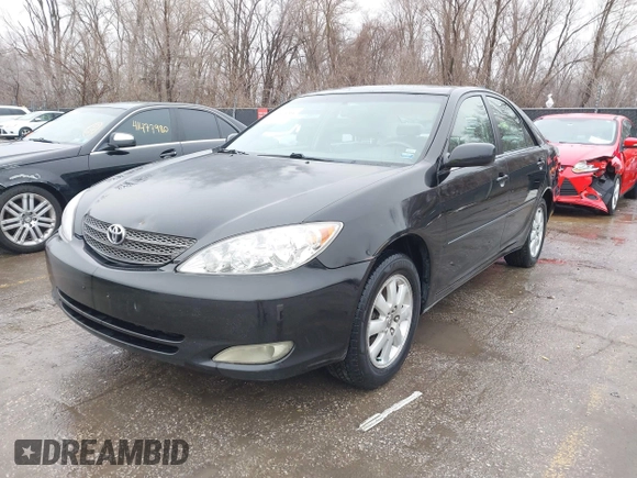 2004 Toyota Camry LE with VIN 4T1BF32K84U074364, listed as a IAAI auction lot 41479264 with 265,865 mi miles. Bid and sale history available at carsss.com. Image 17.