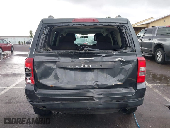 2011 Jeep Patriot Latitude with VIN 1J4NT1GA6BD114558, listed as a IAAI auction lot 41480698 with 199,006 mi miles and . Bid and sale history available at DreamBid. Image 16.