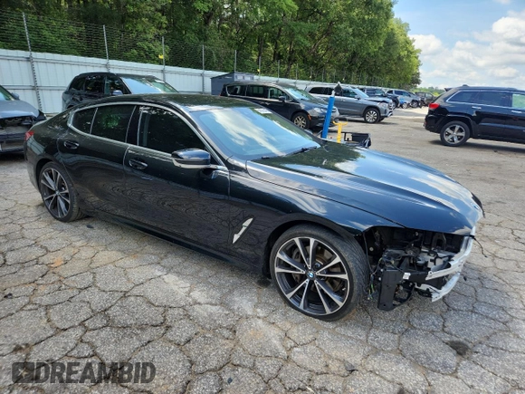 2020 BMW 8 Series 840i with VIN WBAGV2C02LCE04556, listed as a Copart auction lot 61073745 with 60,651 mi miles and Salvage title. Bid and sale history available at DreamBid. Image 4.