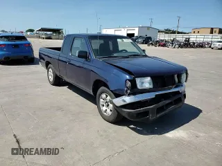 1999 Nissan Frontier XE with VIN 1N6DD26S9XC307893, listed as a Copart auction lot 66045605 with 239,269 mi miles and Salvage title. Bid and sale history available at DreamBid. Image 13.