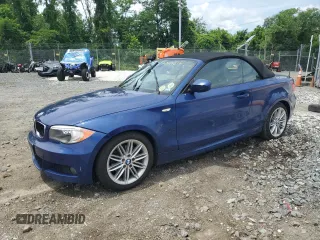 2013 BMW 1 Series 128i with VIN WBAUL7C55DVU09366, listed as a Copart auction lot 60444615 with 176,801 mi miles and Salvage title. Bid and sale history available at DreamBid. Image 1.