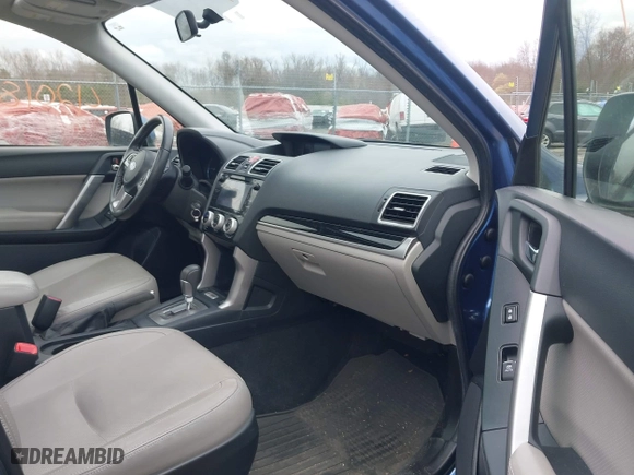 2018 Subaru Forester Limited with VIN JF2SJAJC4JH525104, listed as a IAAI auction lot 42018479 with 97,843 mi miles. Bid and sale history available at carsss.com. Image 5.