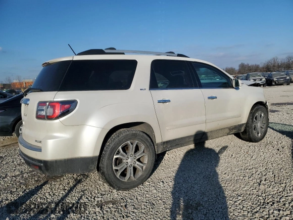 2014 GMC Acadia SLT with VIN 1GKKVSKD9EJ256293, listed as a Copart auction lot 42230505 with 129,458 mi miles and Salvage Title. Bid and sale history available at carsss.com. Image 3.