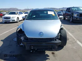 2013 Volkswagen Beetle 2.5L w/Sun/Sound/Nav with VIN 3VWJX7AT5DM606119, listed as a IAAI auction lot 41970253 with 81,004 mi miles and . Bid and sale history available at DreamBid. Image 13.