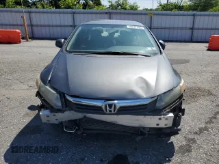 2012 Honda Civic LX z VIN 19XFB2F55CE360542, wystawiony jako Copart lot #59077995 z przebiegiem 139 751 mil mil oraz Szkoda całkowita • Salvage title. Historia ofert i sprzedaży dostępna na DreamBid. Obrazek 5.