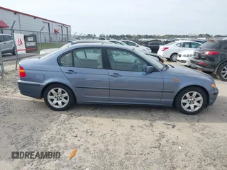2005 BMW 3 Series 325i with VIN WBAET37445NJ85538, listed as a IAAI auction lot 41872686 with 121,237 mi miles. Bid and sale history available at carsss.com. Image 13.