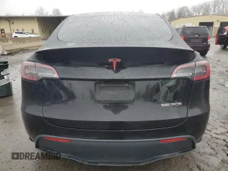 2022 Tesla Model Y Performance z VIN 7SAYGDEF9NF382883, wystawiony jako Copart lot #52028085 z przebiegiem 49 108 mil mil oraz Szkoda całkowita • Salvage title. Historia ofert i sprzedaży dostępna na DreamBid. Obrazek 6.