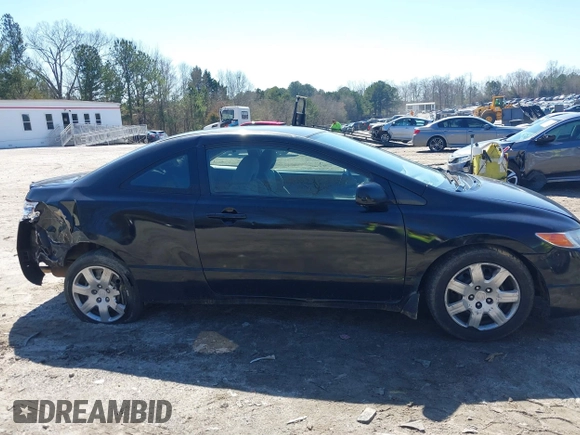 2009 Honda Civic Cpe LX with VIN 2HGFG12669H509744, listed as a IAAI auction lot 41777731 with 202,530 mi miles. Bid and sale history available at carsss.com. Image 12.