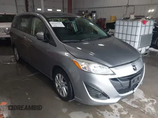 2012 Mazda 5 Sport z VIN JM1CW2BL9C0120530, wystawiony jako IAAI lot #41542285 z przebiegiem 102 752 mil mil oraz . Historia ofert i sprzedaży dostępna na DreamBid. Obrazek 1.