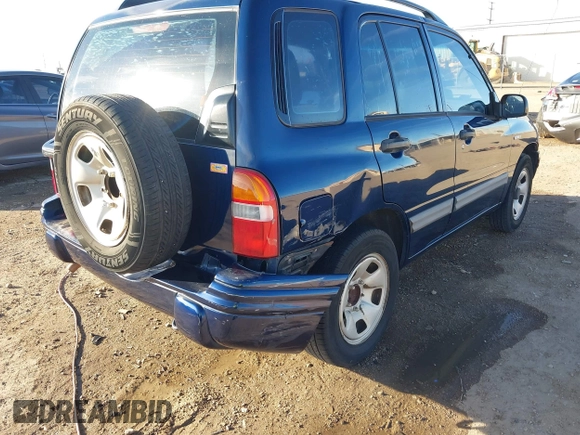 2003 Suzuki Vitara z VIN 2S3TE52V436101091, wystawiony jako IAAI lot #41472279 z przebiegiem 163 429 mil mil oraz . Historia ofert i sprzedaży dostępna na DreamBid. Obrazek 6.