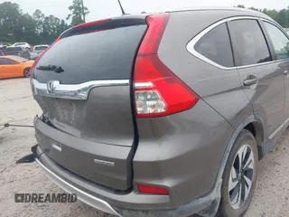 2015 Honda CR-V Touring z VIN 5J6RM3H99FL002315, wystawiony jako IAAI lot #42364421 z przebiegiem 94 018 mil mil oraz . Historia ofert i sprzedaży dostępna na DreamBid. Obrazek 20.