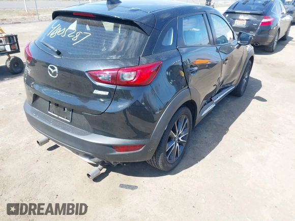 2018 Mazda CX-3 Grand Touring z VIN JM1DKFD75J0312662, wystawiony jako IAAI lot #41805287 z przebiegiem 140 083 mil mil oraz . Historia ofert i sprzedaży dostępna na DreamBid. Obrazek 4.