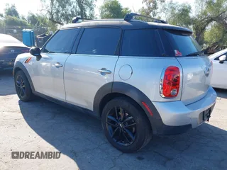 2013 MINI Countryman with VIN WMWZB3C59DWM09740, listed as a IAAI auction lot 41648192 with 145,915 mi miles and . Bid and sale history available at DreamBid. Image 3.