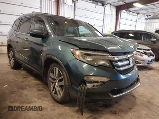 2016 Honda Pilot Elite with VIN 5FNYF6H09GB085621, listed as a IAAI auction lot 41788911 with 137,199 mi miles. Bid and sale history available at carsss.com. Image 1.