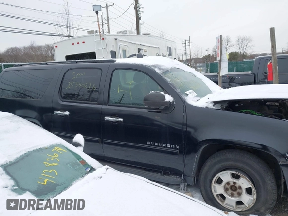 2010 Chevrolet Suburban LS with VIN 1GNUKHE37AR203811, listed as a IAAI auction lot 41304431 with Not provided miles and . Bid and sale history available at DreamBid. Image 12.