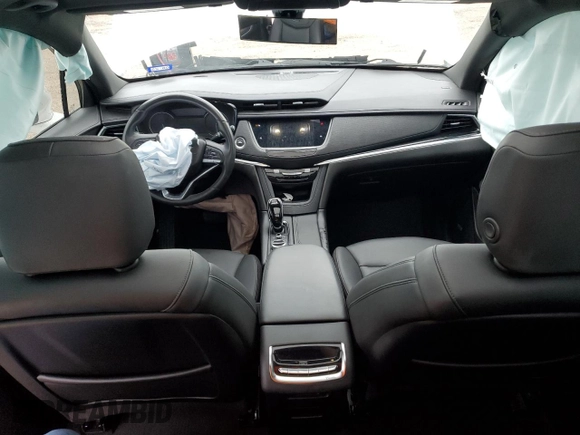 2021 Cadillac XT6 Luxury z VIN 1GYKPAR46MZ132157, wystawiony jako Copart lot #83911054 z przebiegiem 59 473 mil mil oraz Czysty tytuł • Clean title. Historia ofert i sprzedaży dostępna na DreamBid. Obrazek 8.