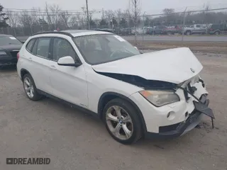 2013 BMW X1 xDrive35i with VIN WBAVM5C53DVV89288, listed as a IAAI auction lot 41609285 with 114,659 mi miles. Bid and sale history available at carsss.com. Image 1.