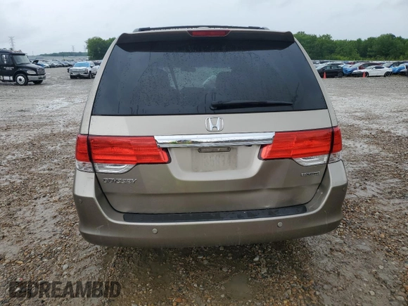2010 Honda Odyssey Touring z VIN 5FNRL3H97AB082525, wystawiony jako Copart lot #56410845 z przebiegiem 94 819 mil mil oraz Szkoda całkowita • Salvage title. Historia ofert i sprzedaży dostępna na DreamBid. Obrazek 6.