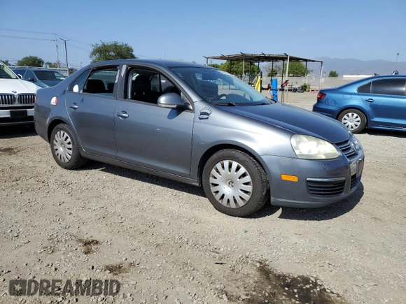 2009 Volkswagen Jetta S с VIN 3VWJZ71K49M014297, выставлен на аукционе Copart как лот 57055395 с пробегом 129 029 миль миль и Чистый • Clean title. История ставок и продаж доступна на DreamBid. Изображение 4.
