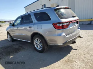 2014 Dodge Durango SXT z VIN 1C4RDJAG6EC972818, wystawiony jako Copart lot #54791215 z przebiegiem 169 718 mil mil oraz Szkoda całkowita • Salvage title. Historia ofert i sprzedaży dostępna na DreamBid. Obrazek 2.