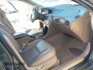 1998 Mercury Sable LS Premium Group z VIN 1MEFM53S0WA638842, wystawiony jako IAAI lot #41557457 z przebiegiem 153 443 mil mil oraz . Historia ofert i sprzedaży dostępna na DreamBid. Obrazek 5.